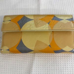 Louis Vuitton patent leather large wallet .